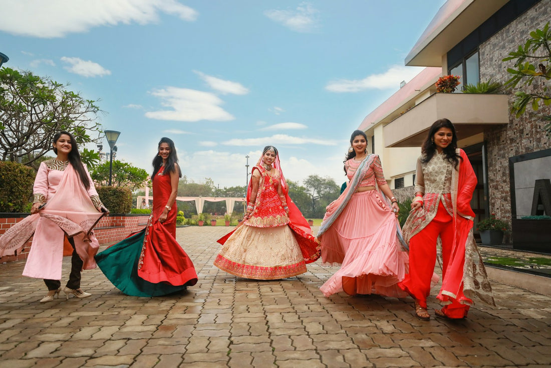 Women in Indian ethnic wear at a celebration — Ananddi wedding guest style guide 2026